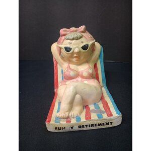 Vintage  "Sunny Retirement"  Labeled Enesco Sun Bathing Lady With Sunglasses 6in